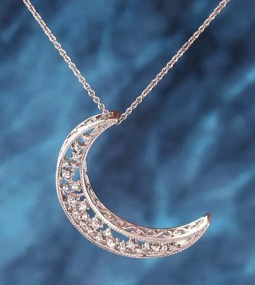 Shimmering Crescent Moon Pendant with Crystals